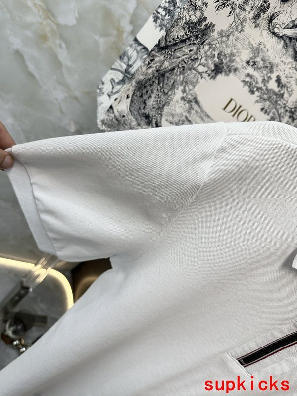 Close-up detail shot of Moncler luxury clothing with signature branding