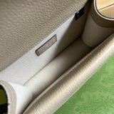 Close-up detail of polished statement women's handbag – women's luxury accessory