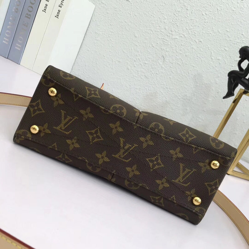 Styled lifestyle shot of modern statement women's handbag – women's designer-style accessory