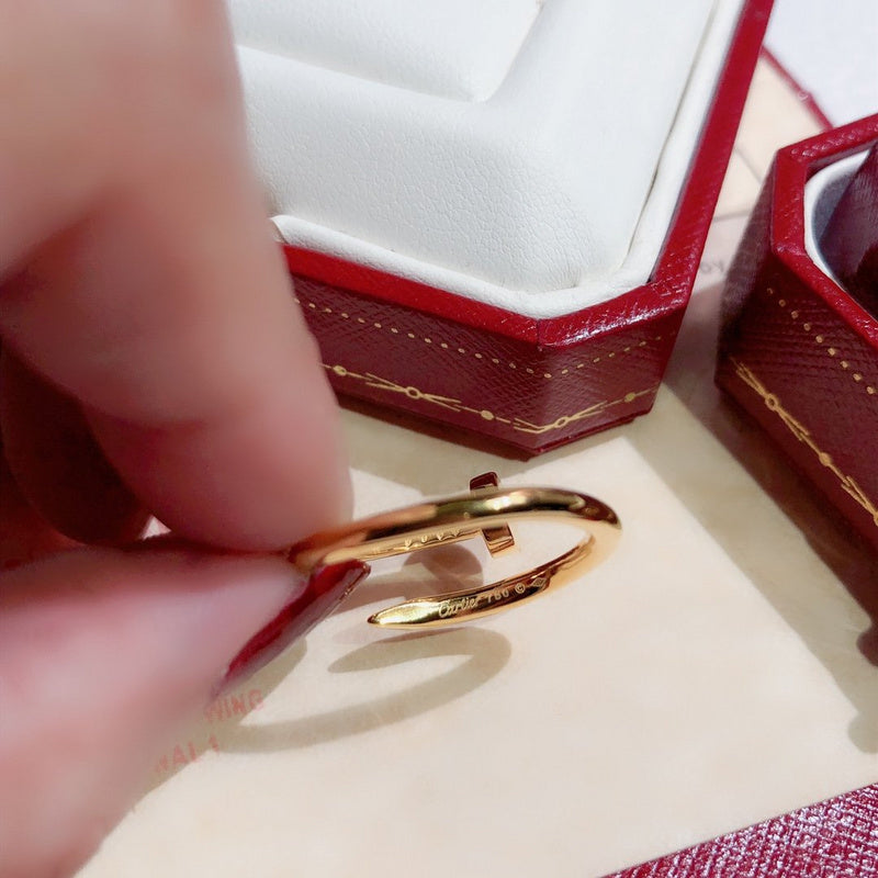 Close-up detail view of Cartier unisex jewelry piece