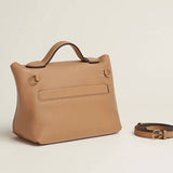 Side view of tailored structured handbag