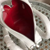 Close-up detail of chic polished women's handbag – women's designer-style accessory