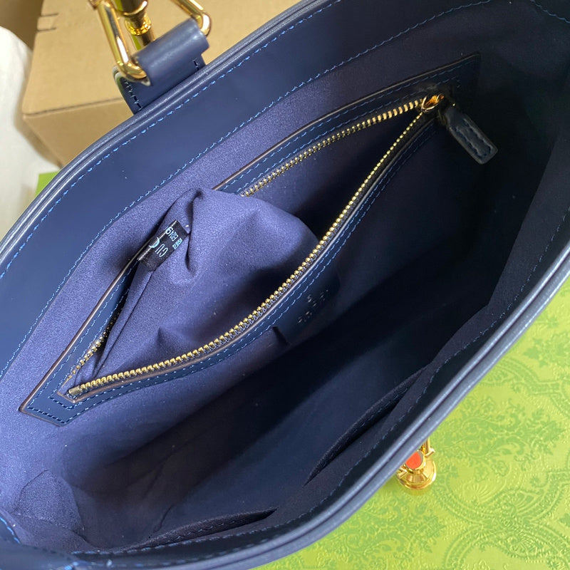 Close-up detail of polished signature women's handbag – women's designer-style accessory