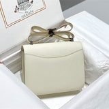 Side view of streamlined structured handbag
