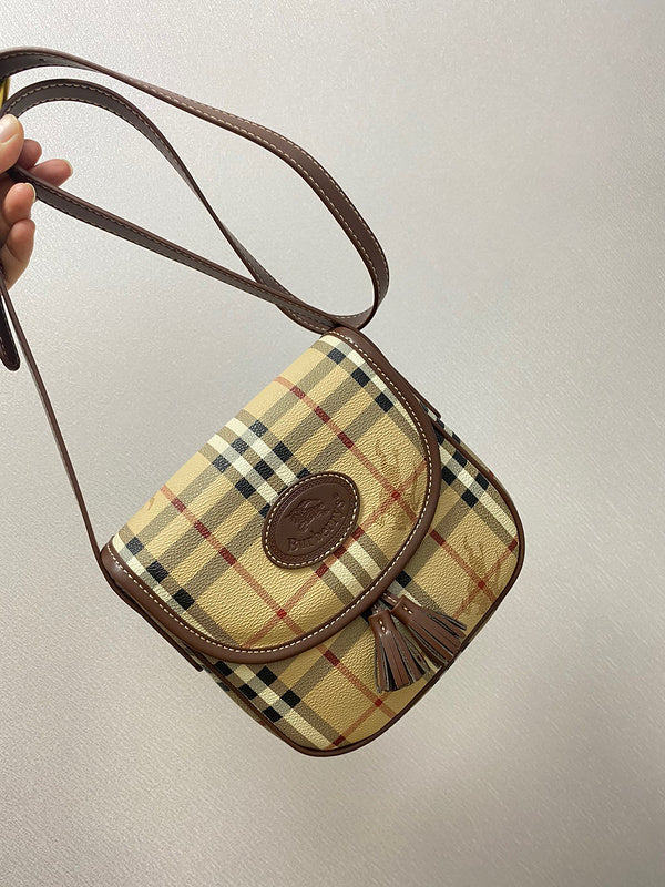 Ziva's Charm handbag – side angle view (one versatile size)