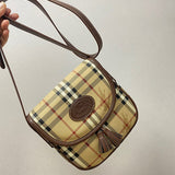 Ziva's Charm handbag – side angle view (one versatile size)