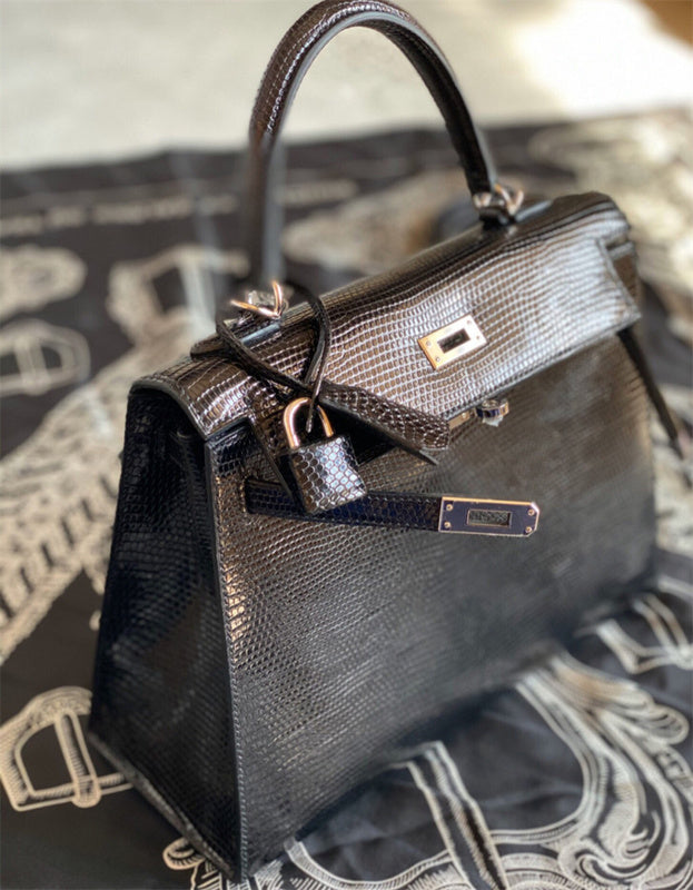 Statement tote bag carried on shoulder
