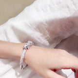 Lifestyle view of Cartier unisex jewelry piece