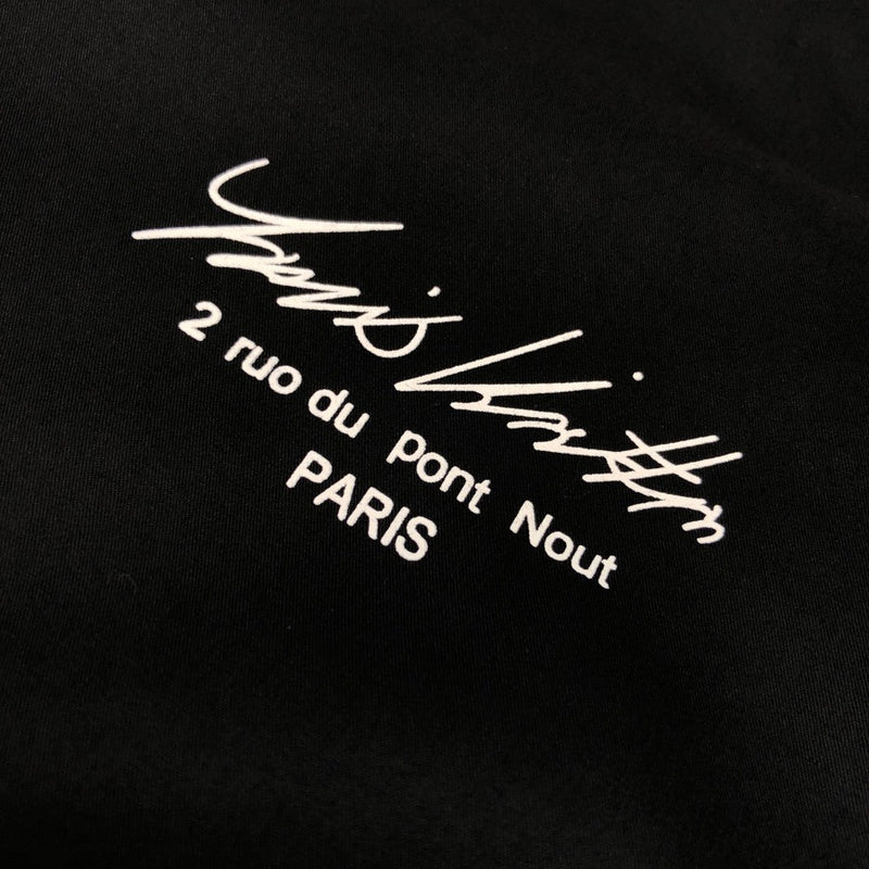 Full styled look of Louis Vuitton luxury clothing with monogram-inspired silhouette