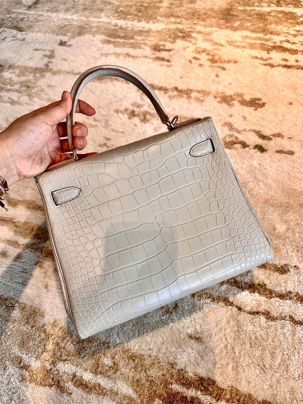  Graceful crossbody bag carried on shoulder