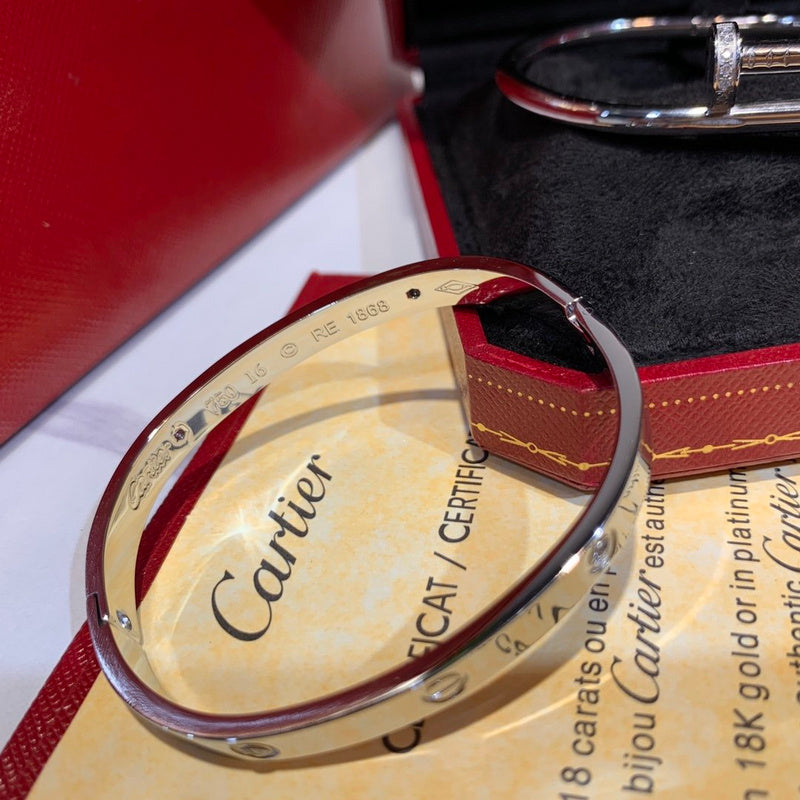 Side view of Cartier unisex jewelry piece