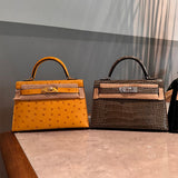 Side view of clean-lined structured handbag