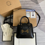 Front view of classic refined women's handbag – women's luxury handbag