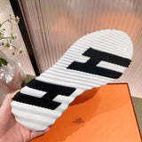 Hermès White High-Top Sneakers - Toe Detail View