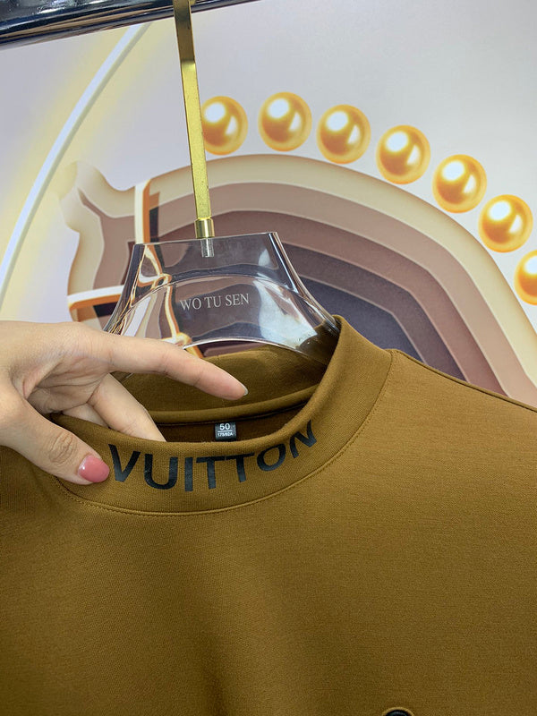 Flat lay presentation of Louis Vuitton luxury clothing with monogram-inspired silhouette