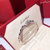 Angled view of Cartier unisex jewelry piece