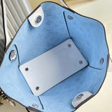 Handle and strap detail of structured sleek women's handbag – women's designer-style accessory