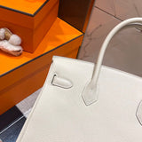 Side view of curated structured handbag