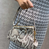 Ziva's Charm handbag – product shot (11.5cm*5.5cm*10cm)