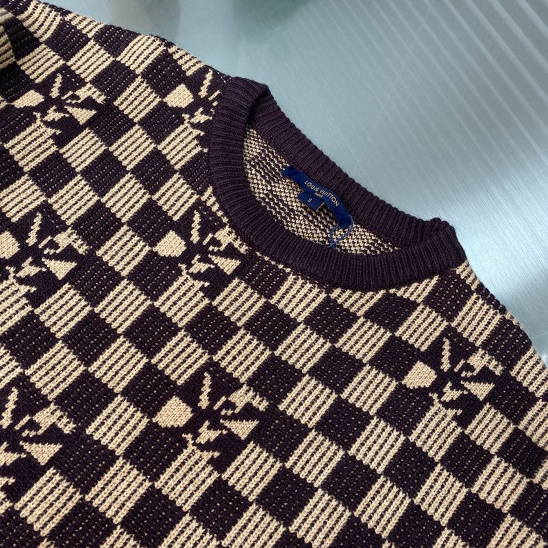 Side profile of Louis Vuitton luxury clothing with monogram-inspired silhouette