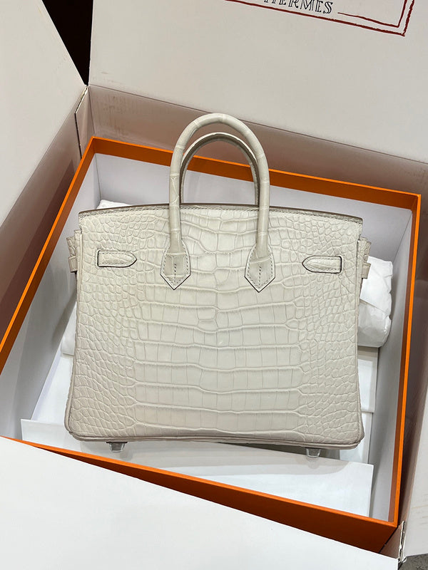 Side view of structured structured handbag