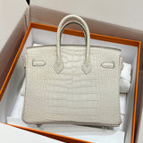 Side view of structured structured handbag