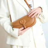 Side profile of refined chic women's handbag – women's designer-style accessory