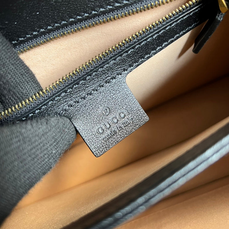 Side profile of classic chic women's handbag – women's luxury handbag