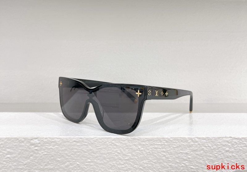 Close-up detail view of Louis Vuitton unisex sunglasses