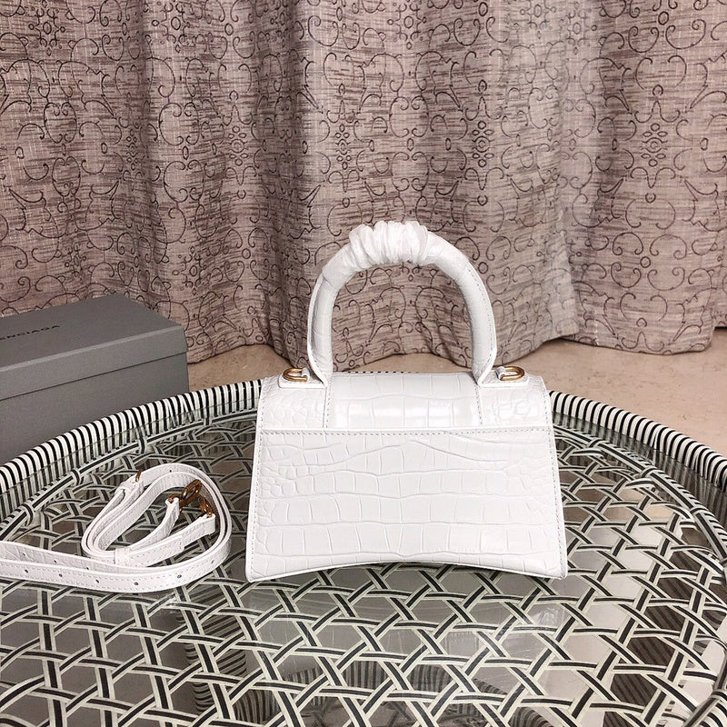 Styled lifestyle shot of structured signature women's handbag – women's premium purse