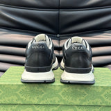 Side profile of Gucci neutral cream sneakers streetwear statement look