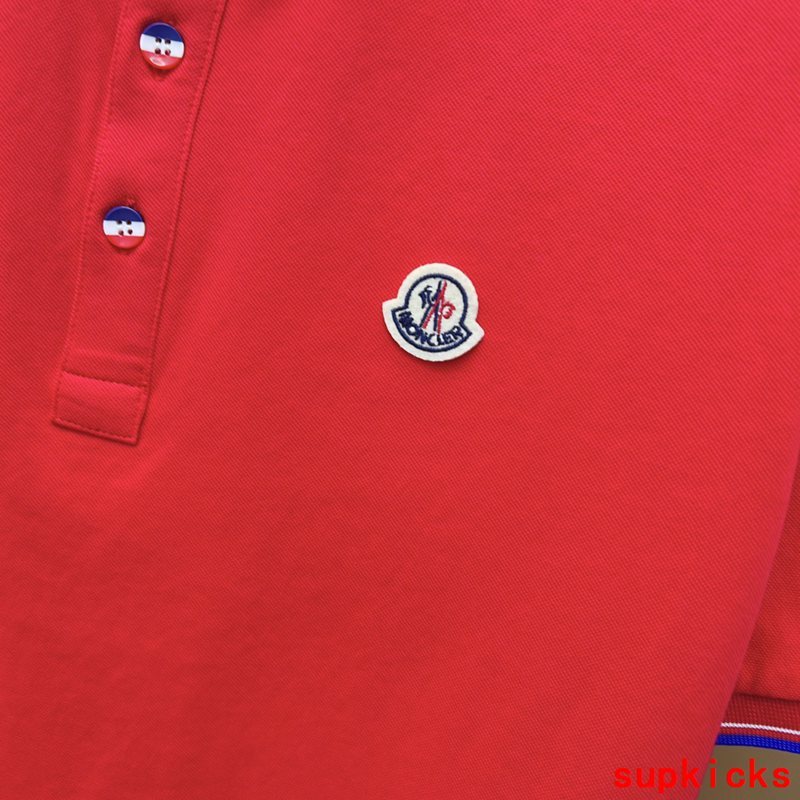 Front view of Moncler luxury clothing with logo-detail design