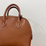 Side view of structured structured handbag