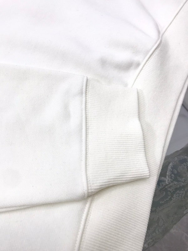 Back view of Louis Vuitton luxury clothing with signature branding