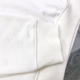 Back view of Louis Vuitton luxury clothing with signature branding