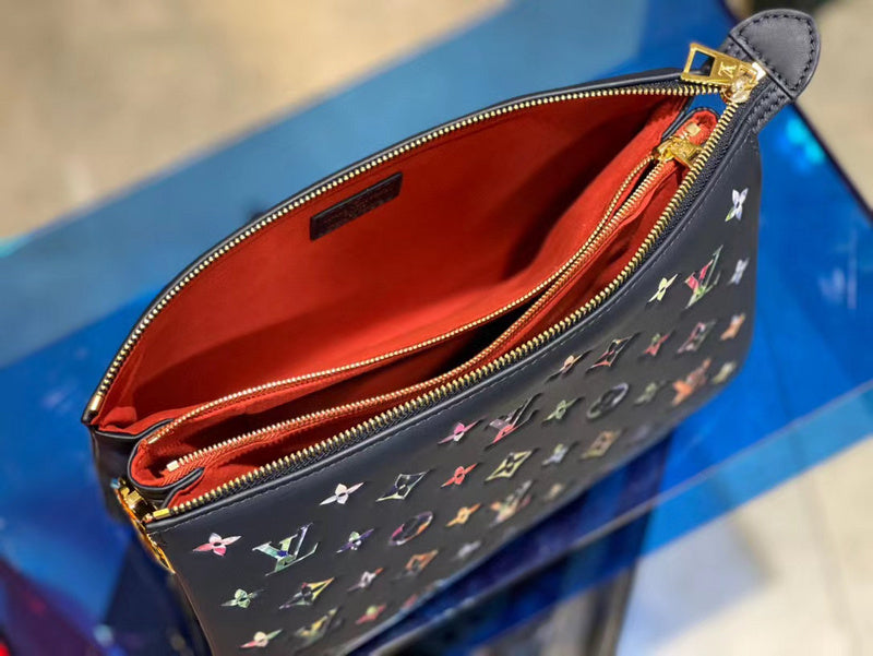 Front view of structured signature women's handbag – women's statement bag