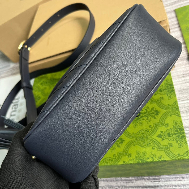 Styled lifestyle shot of classic sleek women's handbag – women's luxury accessory