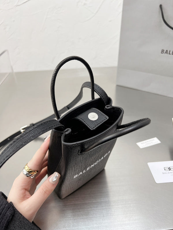 Ziva's Charm handbag – lifestyle view (one versatile size)