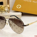Close-up detail view of Louis Vuitton unisex sunglasses