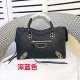 Front view of polished elevated women's handbag – women's luxury accessory