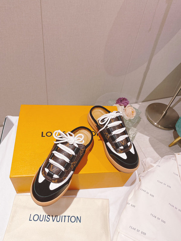 Louis Vuitton Black Pointed-Toe Flats - Front View