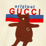 Flat lay presentation of Gucci luxury clothing with everyday silhouette