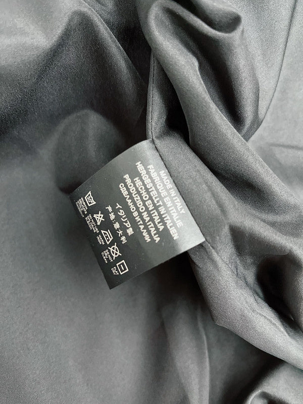 Front view of Gucci luxury clothing with logo-detail design