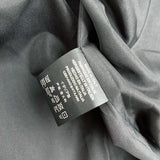 Front view of Gucci luxury clothing with logo-detail design