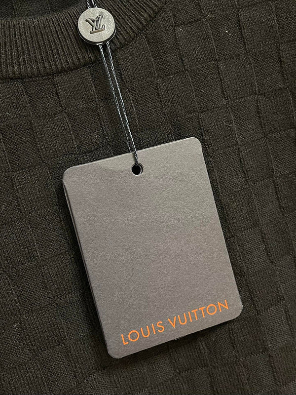 Side profile of Louis Vuitton luxury clothing with label-forward styling