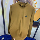 Front view of Louis Vuitton luxury clothing with monogram-inspired silhouette