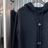 Close-up detail shot of Louis Vuitton luxury clothing with everyday silhouette