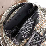 Close-up detail of polished structured women's handbag – women's statement bag
