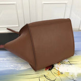 Side profile of modern signature women's handbag – women's designer-style accessory