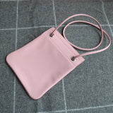 Side view of classic structured handbag